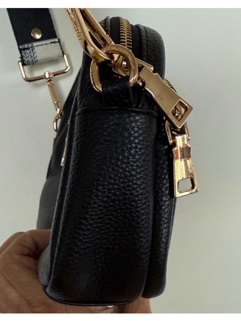 Compact Black Pebble Crossbody with Patterned Strap - Picture 7 of 12